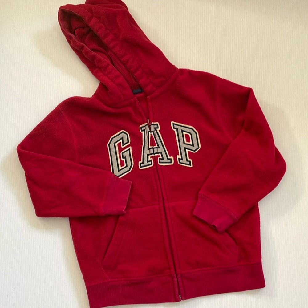 GapKids red hooded, full zip sweatshirt with gray, blue & white GAP.  Size small